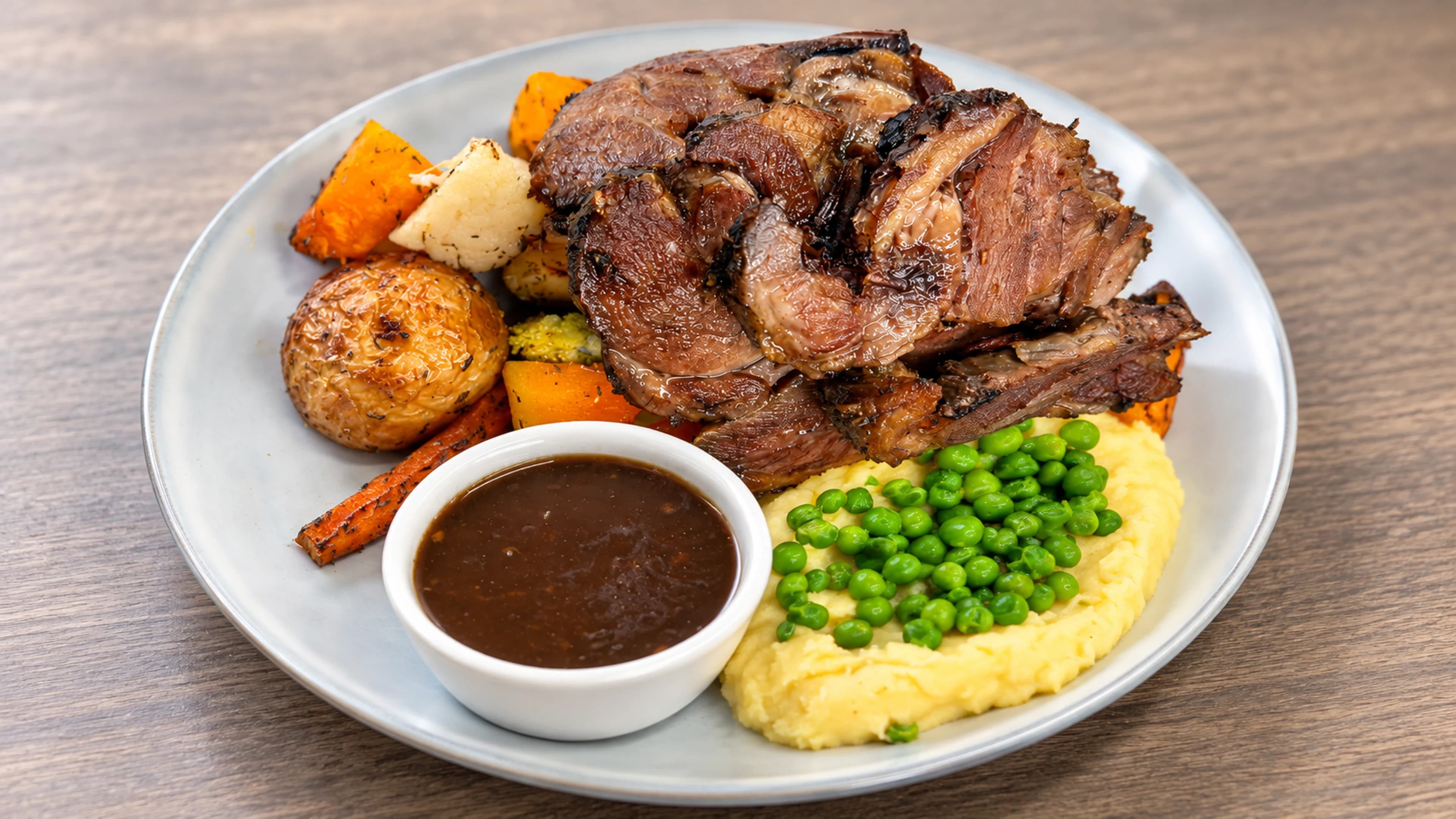 AI-enhanced photo of roast dinner with vegetables and gravy