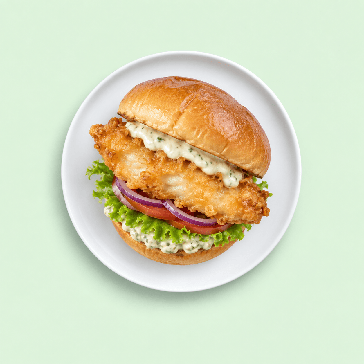 Battered blue cod burger with tartare and salad