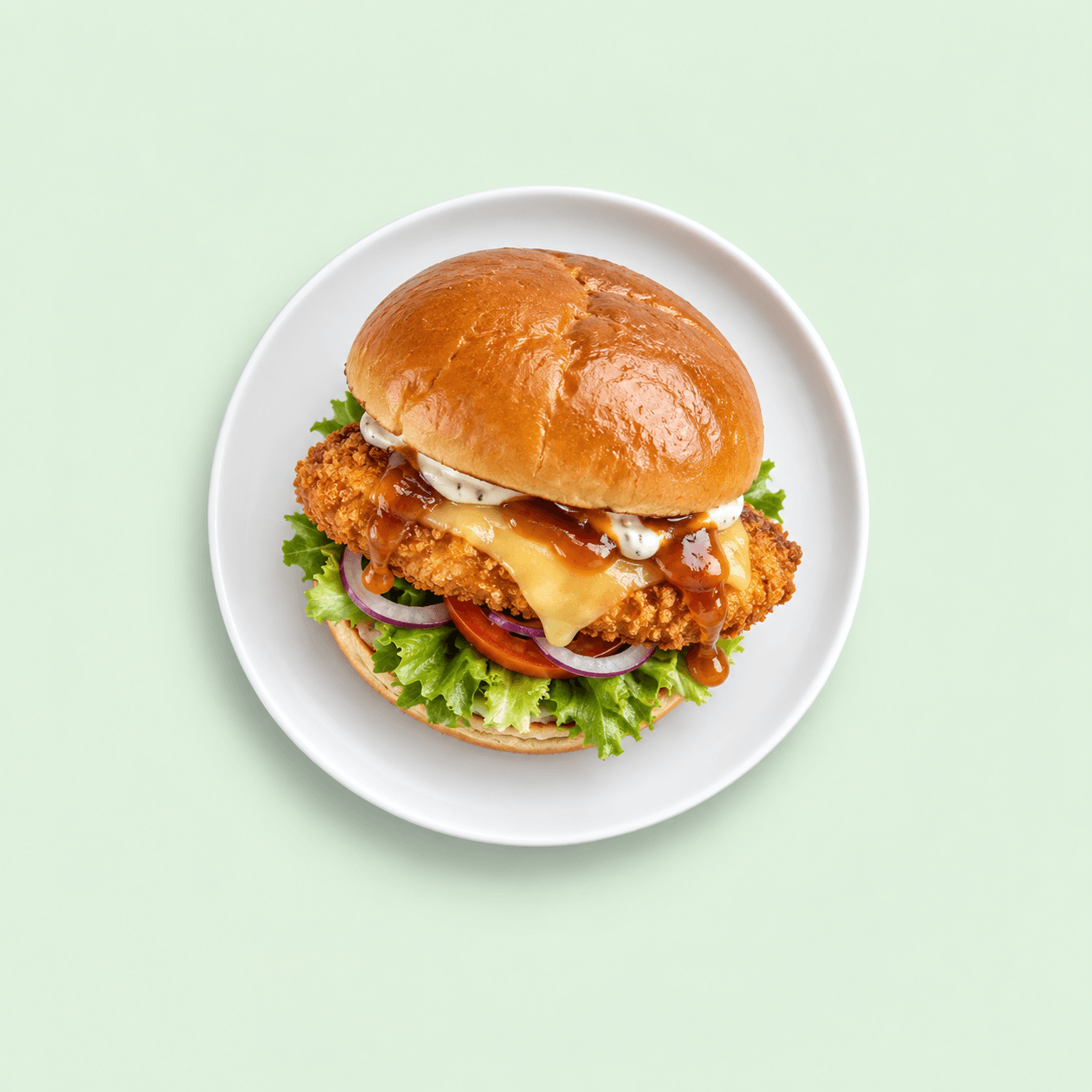 Crumbed chicken deluxe burger with cheese and salad